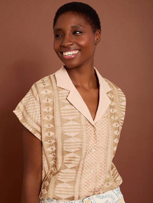 Blusa con tejido bordado en gold