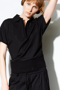 THE BLACK POLO SHIRT